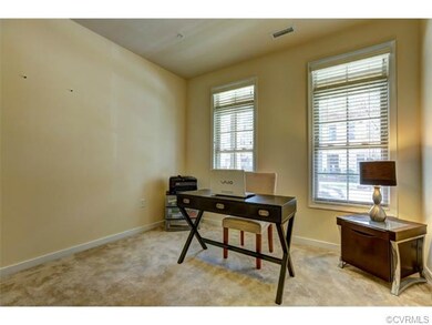First floor office/study, neutral paint and carpet