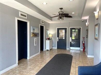 CONDO BUILDING ENTRY FOYER, 2 ELEVATORS FOR CONDO