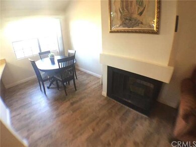 Cozy fireplace next to dining area... 