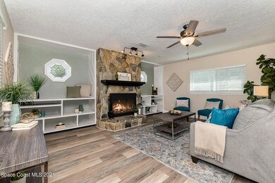 Living Room with Stone Fireplace