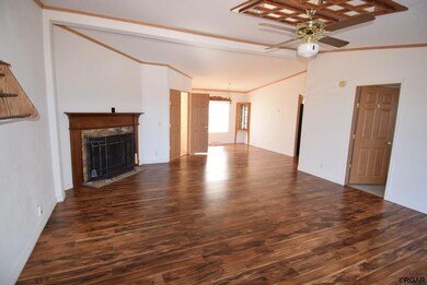 Living Room with Corner Fireplace