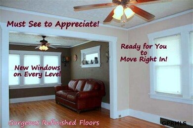 Loads of light pours in through the newer, efficient windows throughout, showcasing the gorgeous woodwork, moldings & hardwood floors!