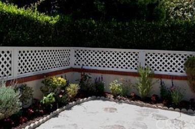 The sunny private patio is enclosed.