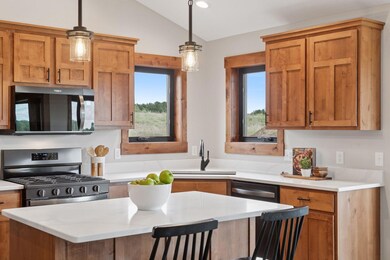 Photos are of a previously completed home with similar design and features. Actual selections, finishes, and materials may vary based on buyer choices and availability.