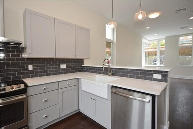 Kitchen picture may be for a different unit, but s