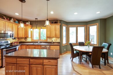 Open concept from kitchen to living room provides 
