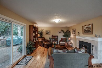 Comfortable family room space with fireplace and a