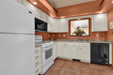 So much natural light makes this kitchen a place t