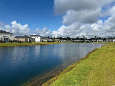 Water view with nearby suburban area
