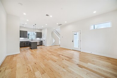 Bright and open living area seamlessly flows into