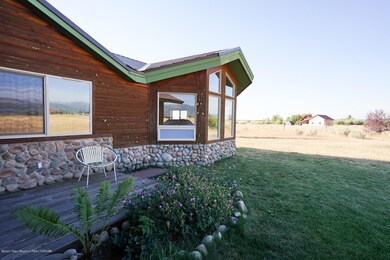 2 Front of house exterior with patio