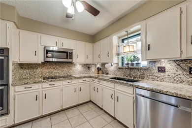 Bright Kitchen with Stainless Appliances, Granite,