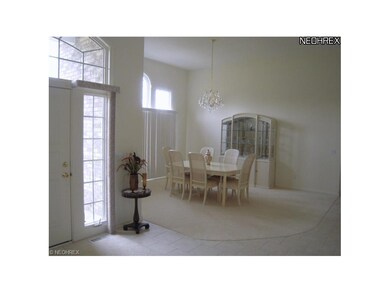 Abundant natural light enhances formal dining area