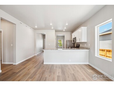 857 Emerald Lakes St, Severance, CO 80550 - photo 7