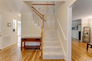 Spacious foyer/entryway. Beautiful hardwood floors