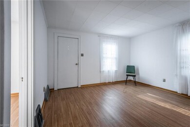 Enter through the front door into the living room 