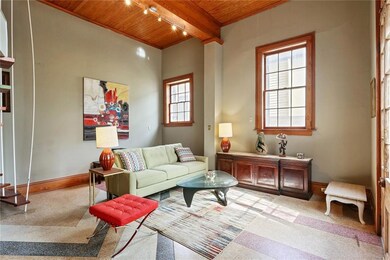 First floor has lots of sunllight, high ceilings w