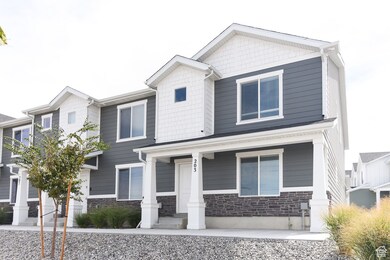 Craftsman-style house with stone siding and covered porch