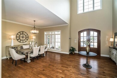 Hand scraped wood floors grace most of the first f