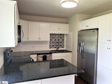 ALL NEW! Black granite countertops, white cabinets