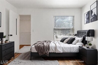 Bedroom with wood finished floors