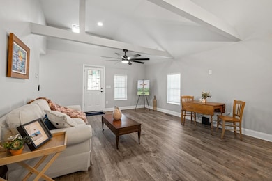 Enter to see the spacious family room boasting stu