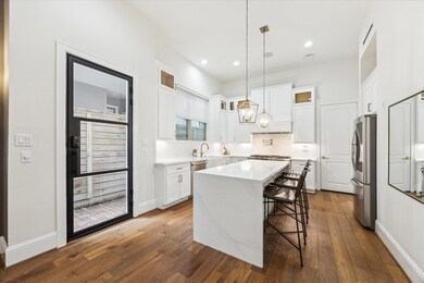 The heart of the home, this open and inviting kitc