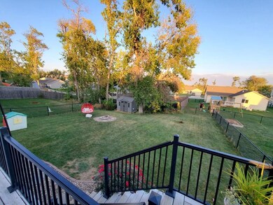 View of backyard from deck.