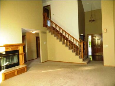 Living room with view through fireplace