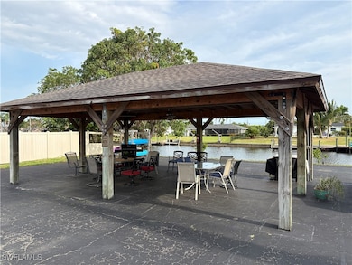Surrounding community featuring a gazebo, a water