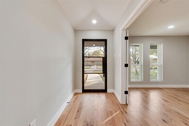 Front door with the office space right when you en