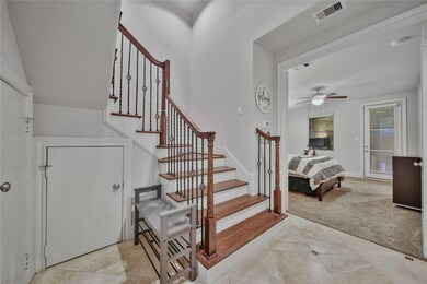 Past the Staircase is Bedroom 2 that Makes a Great