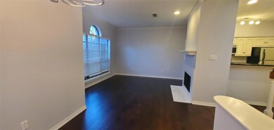 Unfurnished dining area featuring rail lighting, o