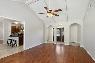 Living Room - view into kitchen & foyer - entryway