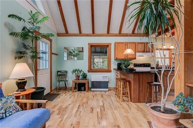 Deck entrance into spacious living room, beautiful