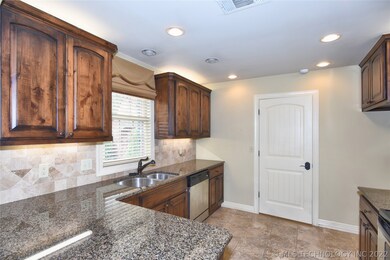 Gourmet kitchen with granite countertops.