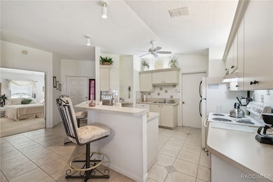 Master Bedroom to the left, front entrance and the