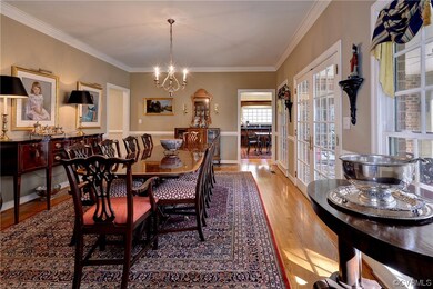 The elegant dining room opens to the large, covered porch.