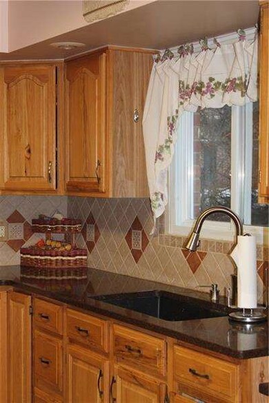 Ceramic tile flooring and granite counter tops les