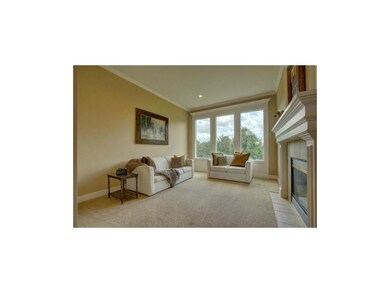 Inviting living room area provides plenty of natur