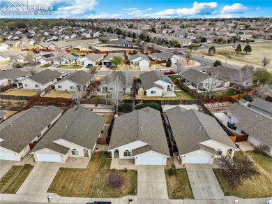 Aerial view of home and neighborhood
