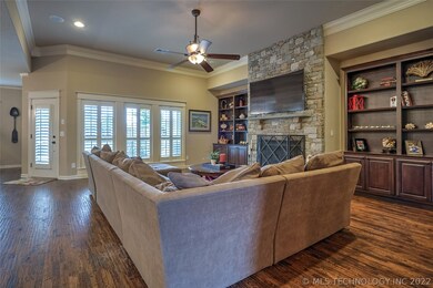Den/living, open to kitchen, hand scraped wood flo