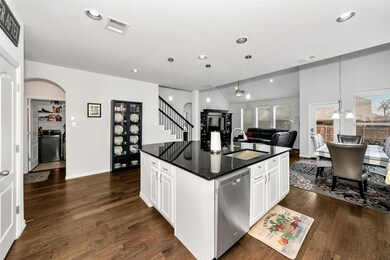 An open floorplan merges the kitchen space with th
