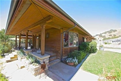 THE FRONT DOOR AND SIDE LAWN, ONE OF THREE LAWN AR