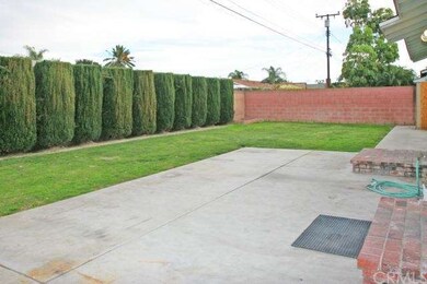 Well Manicured Private Backyard with Patio, Lawn, 
