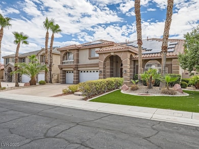 Mediterranean / spanish-style home with stucco siding, concrete driveway, an attached garage, a tiled roof, and solar panels