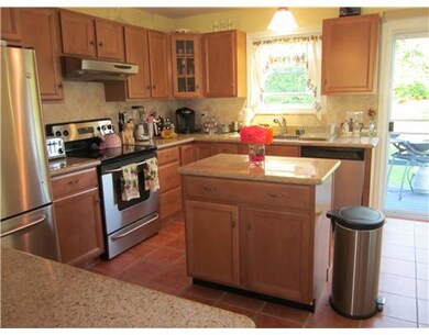 Kitchen. Stunning granite island & countertops...l