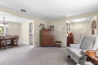Formal Living Room and Dining Room with Wall-to-Wa