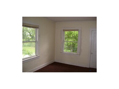 Bedroom three showing small deck outside of window