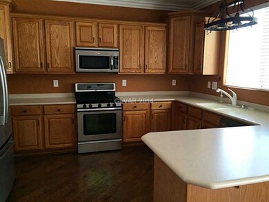 Property Photo. Kitchen Cabinets